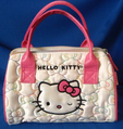 Hello Kitty white and pink handbag.png